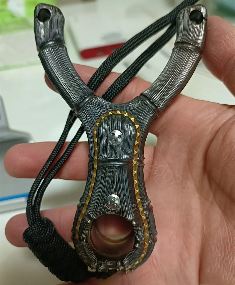 Titanium alloy Hunting Slingshot High Precision Shooting Catapult Outdoor Tactical Games Competition Compound Bow Rubber band
Titanium alloy Hunting Slingshot High Precision Shooting Catapult Outdoor Tactical Games Competition Compound Bow Rubber band