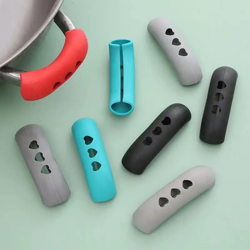 Non-slip Pan Handle Holder Anti-scalding Steamer Casserole Pot Ear Clip Silicone Insulation Glove Clips Heat Insulation
Non-slip Pan Handle Holder Anti-scalding Steamer Casserole Pot Ear Clip Silicone Insulation Glove Clips Heat Insulation