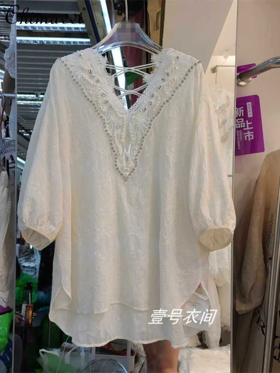 European 2022 Summer New Fashion Lace Collar French Exquisite Rhinestone Backless Shirt Loose Elegant Long-Sleeve Women Tops
European 2022 Summer New Fashion Lace Collar French Exquisite Rhinestone Backless Shirt Loose Elegant Long-Sleeve Women Tops