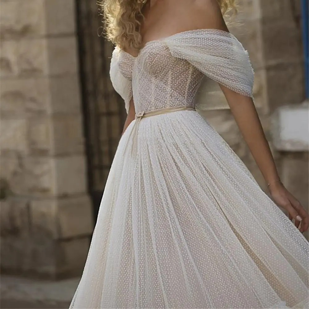 Off the Shoulder Crisscross Tulle A-line Wedding Dress with Belt Dark Snow Tulle Bridal Dress Simple Style
Off the Shoulder Crisscross Tulle A-line Wedding Dress with Belt Dark Snow Tulle Bridal Dress Simple Style