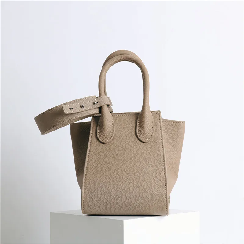 2022 New Vintage Bucket Bag Niche Design High Sense Fashion One Shoulder Portable Women's Bag Top Leather Bag
2022 New Vintage Bucket Bag Niche Design High Sense Fashion One Shoulder Portable Women's Bag Top Leather Bag