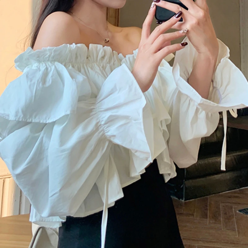 

Slash Neck Off Shoulder Shirt Woman Ruffled French Chic Long Flare Sleeve Shirts Female Solid Color Crop Top Mujer Dropshipping