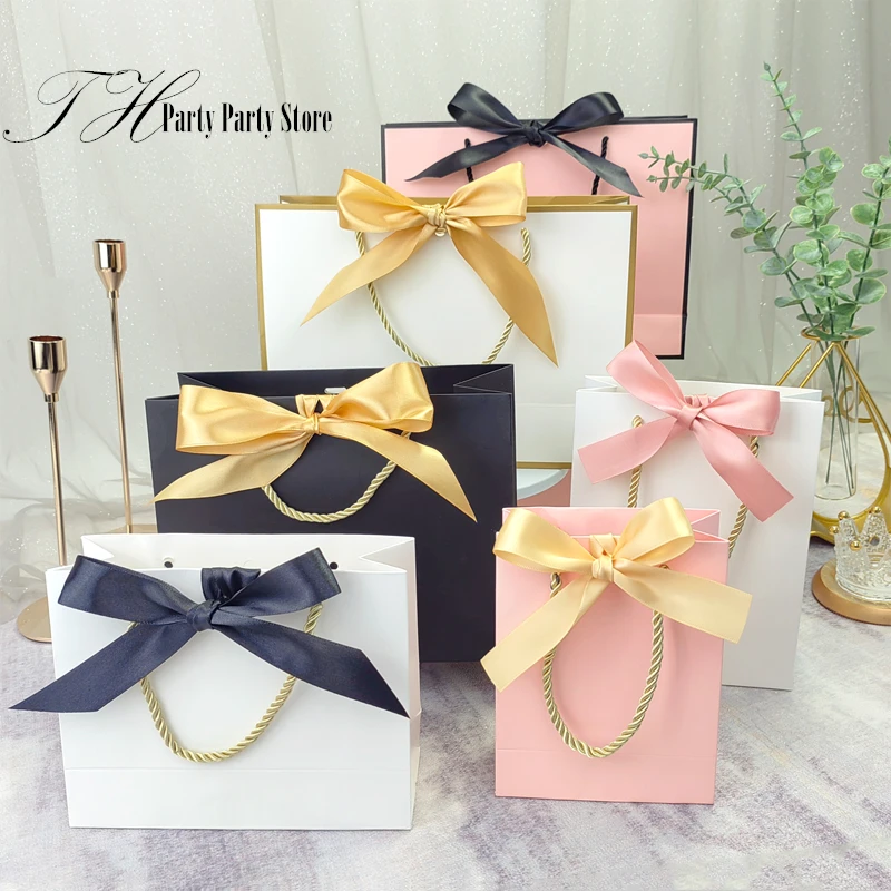10Pcs/Lot New White Black Bow High Quality Simple Gift Bag Kraft Paper Candy Box With Handle Wedding Birthday Party Gift Bag
10Pcs/Lot New White Black Bow High Quality Simple Gift Bag Kraft Paper Candy Box With Handle Wedding Birthday Party Gift Bag