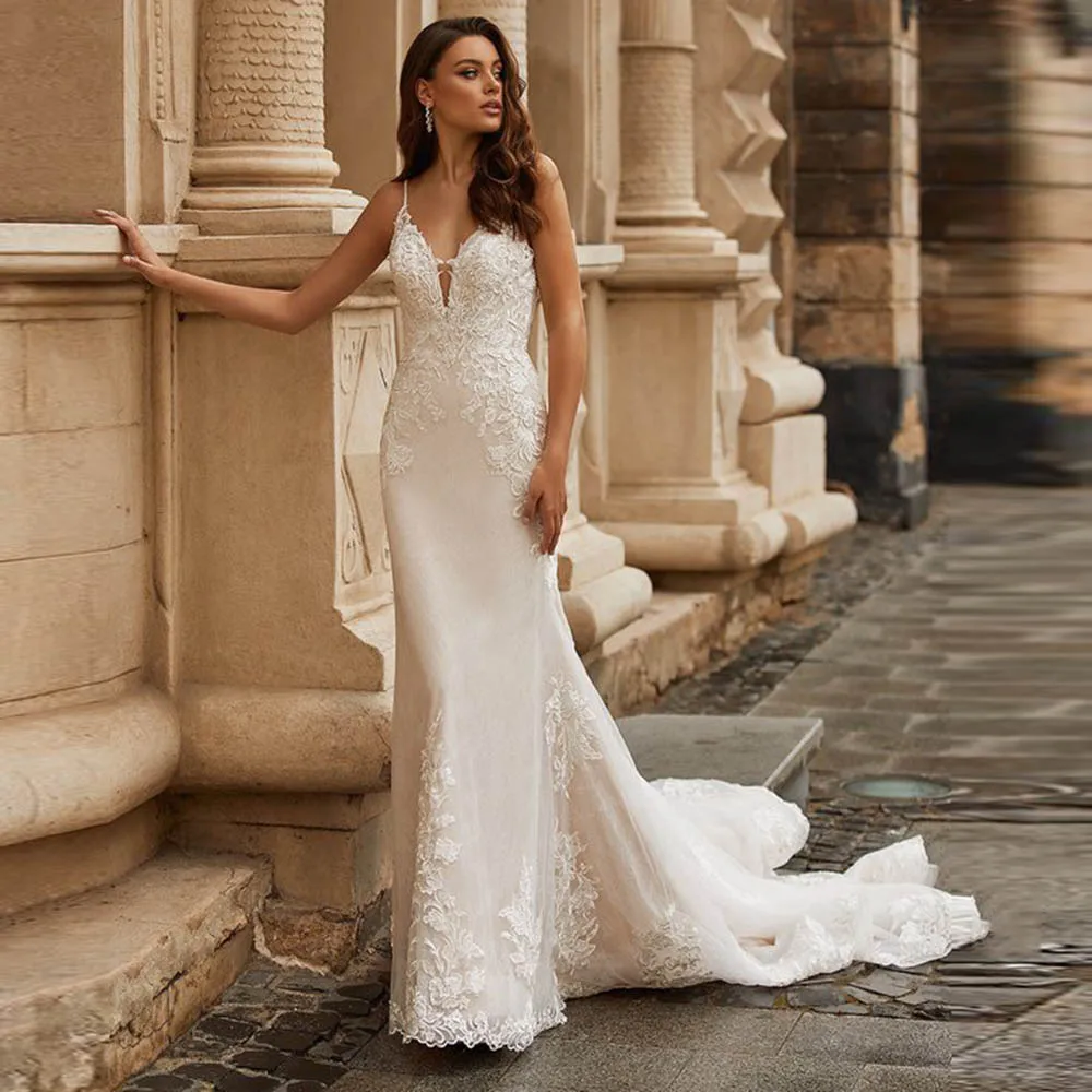 Floral Applique Lace V Neck Tulle Wedding Dresses Sleeveless Spaghetti Straps Backlesss Sweep Train Mermaid Button Bride Gowns
Floral Applique Lace V Neck Tulle Wedding Dresses Sleeveless Spaghetti Straps Backlesss Sweep Train Mermaid Button Bride Gowns