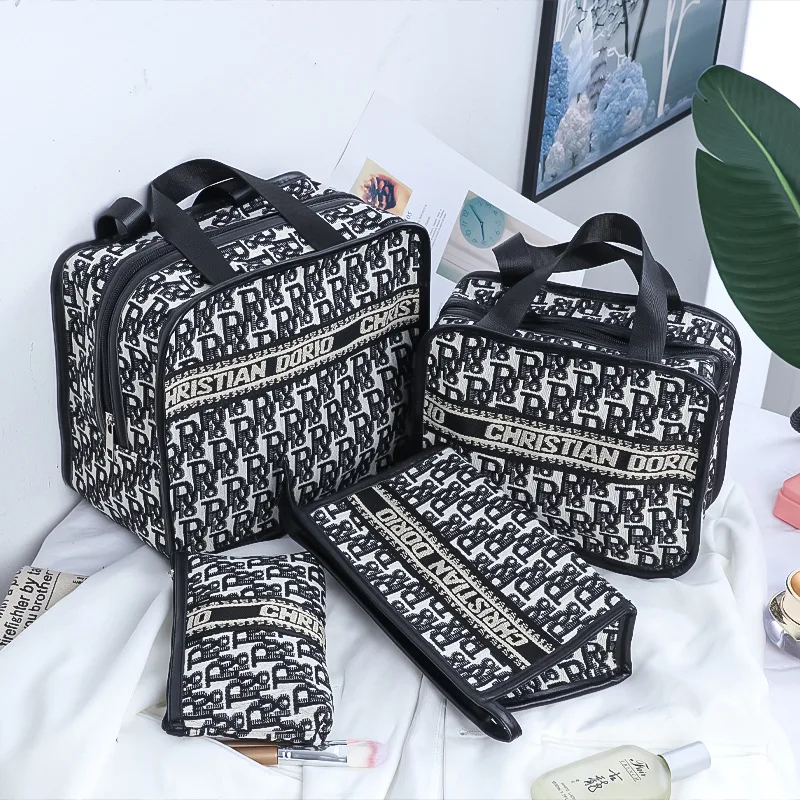 INS Style Travel Makeup Bag Black and White Plaid Buns Multifunctional Ladies Makeup Brush Storage Handbag
INS Style Travel Makeup Bag Black and White Plaid Buns Multifunctional Ladies Makeup Brush Storage Handbag