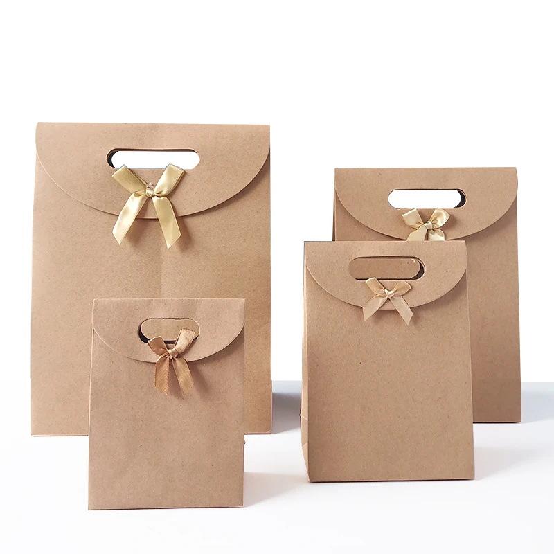 10PCS Flip Top Bow Kraft Paper Gift Bag Japanese Paper Bag with Clasp Tote Bag Gift Clothing Shopping Bags
10PCS Flip Top Bow Kraft Paper Gift Bag Japanese Paper Bag with Clasp Tote Bag Gift Clothing Shopping Bags
