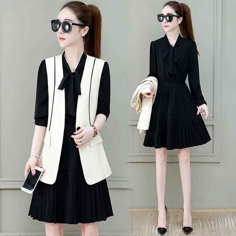 Midi Dress Suit Female 2022 Spring and Autumn New Fashion Korean Casual Vest Black Pleated Shirt Dresses Two-piece Suit E338
Midi Dress Suit Female 2022 Spring and Autumn New Fashion Korean Casual Vest Black Pleated Shirt Dresses Two-piece Suit E338