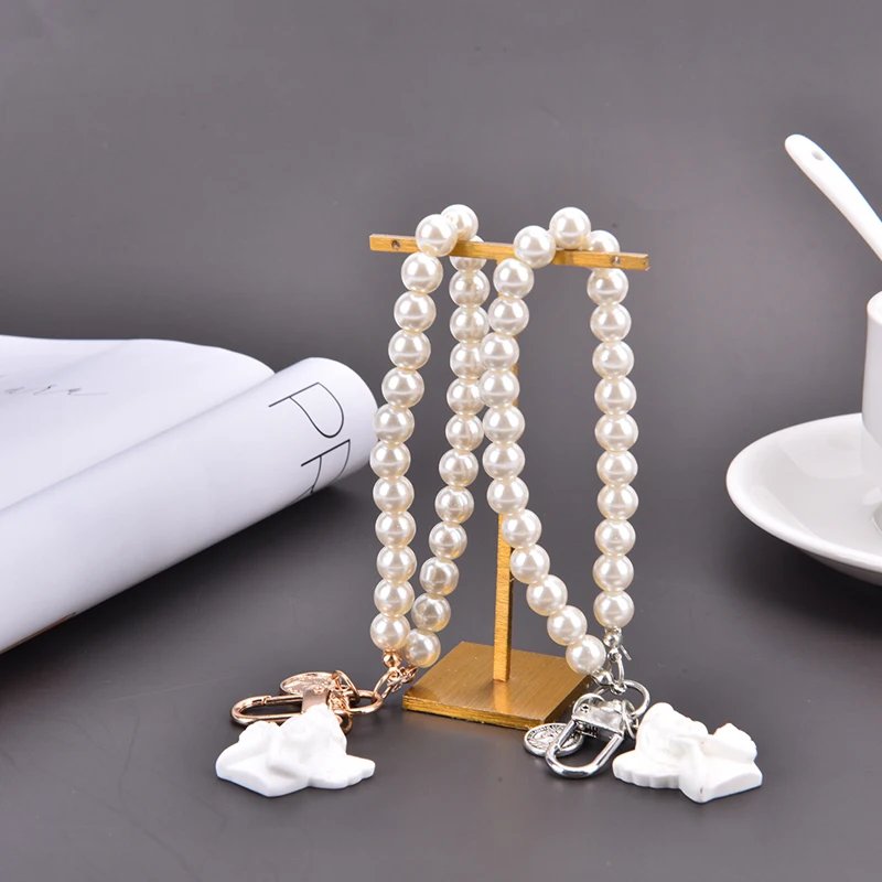 Креативный винтажный брелок с белым ангелом, милый женский мини жемчужный брелок в форме сердца, брелок для автомобильных ключей, держатель...
Креативный винтажный брелок с белым ангелом, милый женский мини жемчужный брелок в форме сердца, брелок для автомобильных ключей, держатель...