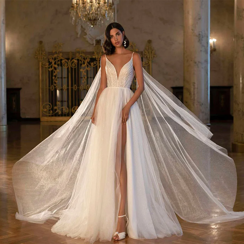 Fashion V-Neck Spaghetti Straps Tulle High Side Split Wedding Dress Bling Bling Beach Bridal Gowns Custom Made
Fashion V-Neck Spaghetti Straps Tulle High Side Split Wedding Dress Bling Bling Beach Bridal Gowns Custom Made