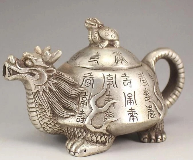 Silver-plated white copper dragon pot Decoration kettle teapots copper pot decorative antique collection
Silver-plated white copper dragon pot Decoration kettle teapots copper pot decorative antique collection