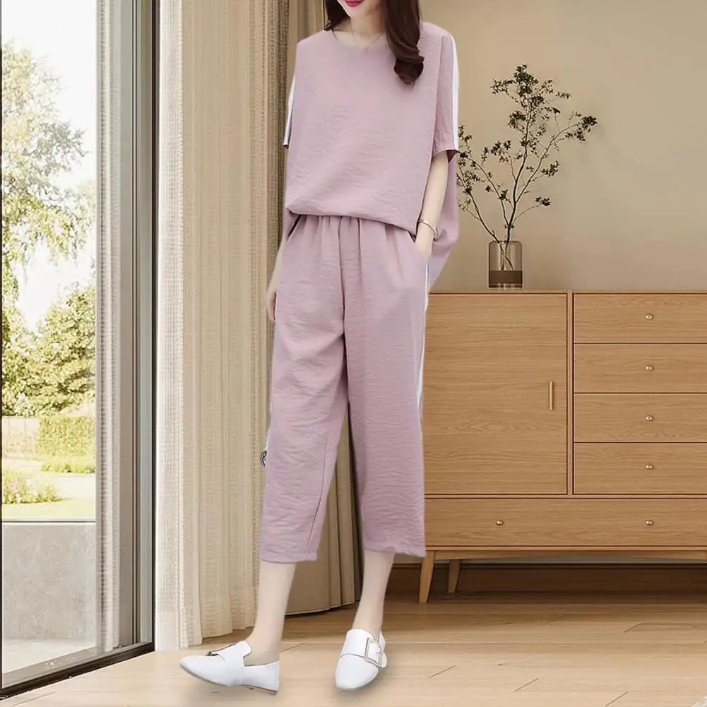 2 Pcs/Set Women T-shirt Pants Set Solid Color Short Sleeves Women Tracksuit Loose Round Neck Elastic Waist Lady Top Pants Set
2 Pcs/Set Women T-shirt Pants Set Solid Color Short Sleeves Women Tracksuit Loose Round Neck Elastic Waist Lady Top Pants Set