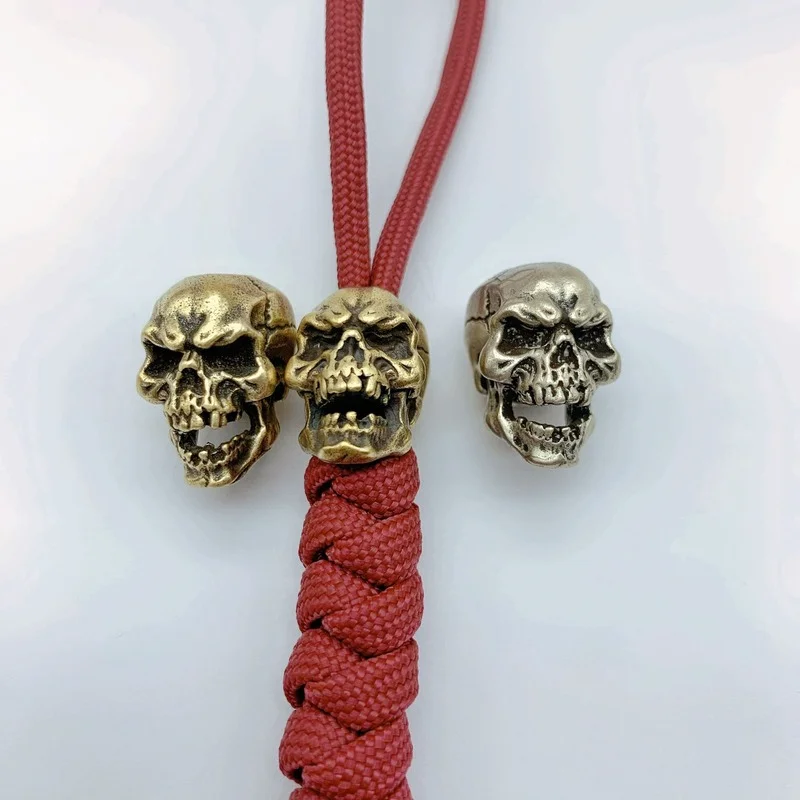 Punk Brass Skull Knife Beads Umberalla Rope Bead White Copper Retro Skull Face Paracord Bead Car Keychains Hanging Pendant Gifts
Punk Brass Skull Knife Beads Umberalla Rope Bead White Copper Retro Skull Face Paracord Bead Car Keychains Hanging Pendant Gifts