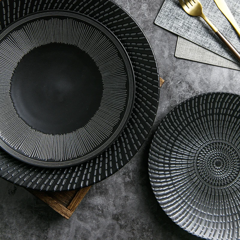 European-style black western restaurant plate creative ceramic steak plate simple snack plate flat plate pasta plate
European-style black western restaurant plate creative ceramic steak plate simple snack plate flat plate pasta plate