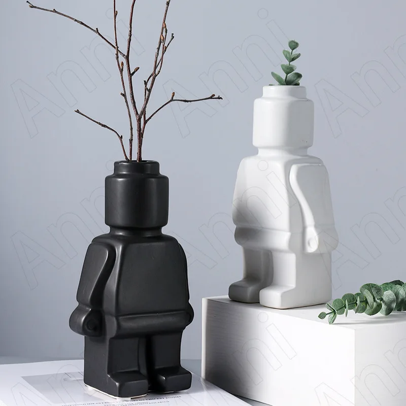 Creativity Ceramic Statue Abstract Robot Living Room Desktop Flower Vase Office Modern Ornaments Home Decoration Accessories
Creativity Ceramic Statue Abstract Robot Living Room Desktop Flower Vase Office Modern Ornaments Home Decoration Accessories