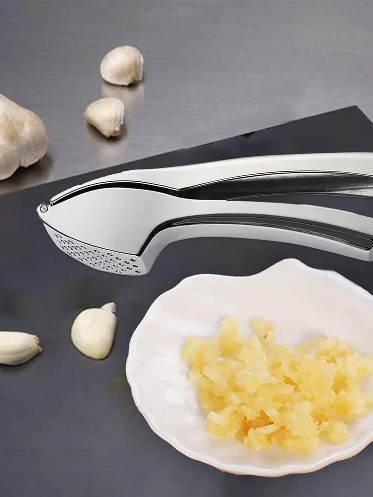 Stainless Steel Kitchen Garlic Press Handheld Manual Tool For Ginger Chilies And Vegetables Pressing And Minced Cooking Gadget
Stainless Steel Kitchen Garlic Press Handheld Manual Tool For Ginger Chilies And Vegetables Pressing And Minced Cooking Gadget