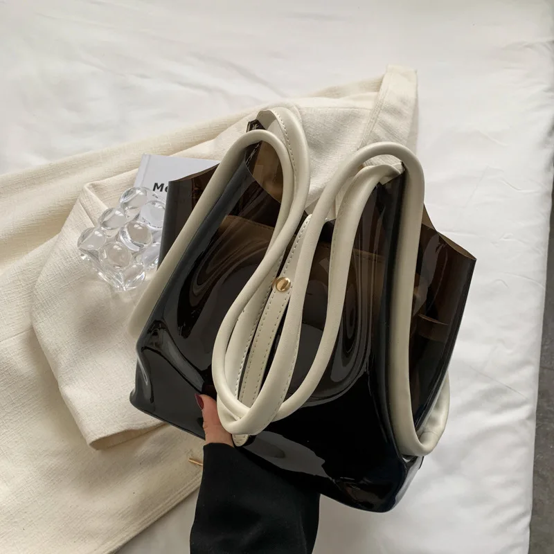 Big Capacity Women's Bag 2022 Trend Summer Transparent PVC Bags Women Jelly Bags Luxury Designer Handbag Women Bucket Bags
Big Capacity Women's Bag 2022 Trend Summer Transparent PVC Bags Women Jelly Bags Luxury Designer Handbag Women Bucket Bags