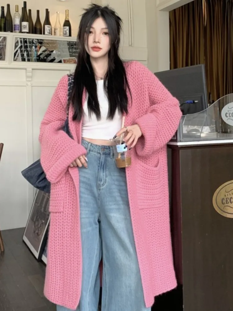 Женский свитер с карманами средней длины, однотонный Повседневный свободный трикотажный свитер с длинными рукавами в Корейском стиле, весна 2023
Женский свитер с карманами средней длины, однотонный Повседневный свободный трикотажный свитер с длинными рукавами в Корейском стиле, весна 2023