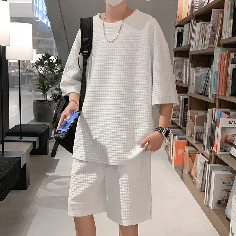Summer waffle T-shirt simple leisure fashion sports suit men's Hong Kong Style ins loose solid color short sleeved Capris tw
Summer waffle T-shirt simple leisure fashion sports suit men's Hong Kong Style ins loose solid color short sleeved Capris tw