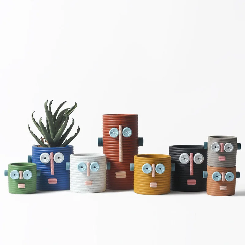 Nordic abstract face flowerpot cute robot portrait flowerpot creative hole cement flowerpot home garden decoration ornaments
Nordic abstract face flowerpot cute robot portrait flowerpot creative hole cement flowerpot home garden decoration ornaments