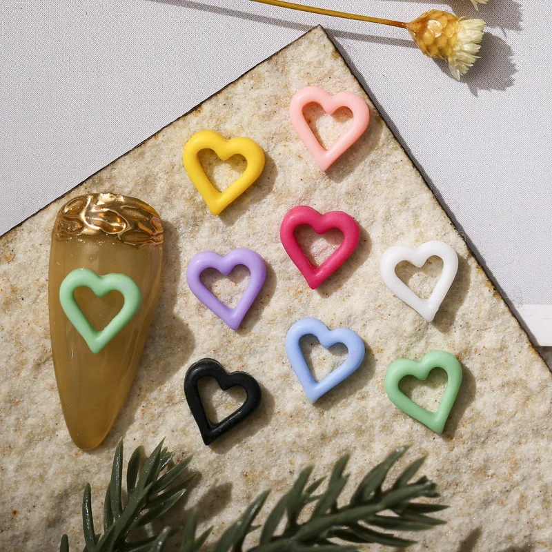 100pcs Multi Color Heart Charms Resin Hollow Heart Design Nail Art Rhinestone Decorations Trendy DIY Manicure Accessory Supplies
100pcs Multi Color Heart Charms Resin Hollow Heart Design Nail Art Rhinestone Decorations Trendy DIY Manicure Accessory Supplies