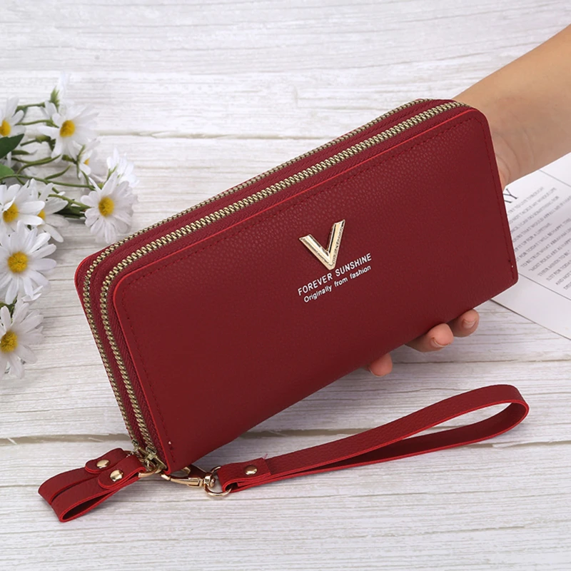 Women's wallet fashion V Ladies mobile phone bag long ladies new clutch bag star Double zipper hand strap bag Multiple color
Women's wallet fashion V Ladies mobile phone bag long ladies new clutch bag star Double zipper hand strap bag Multiple color