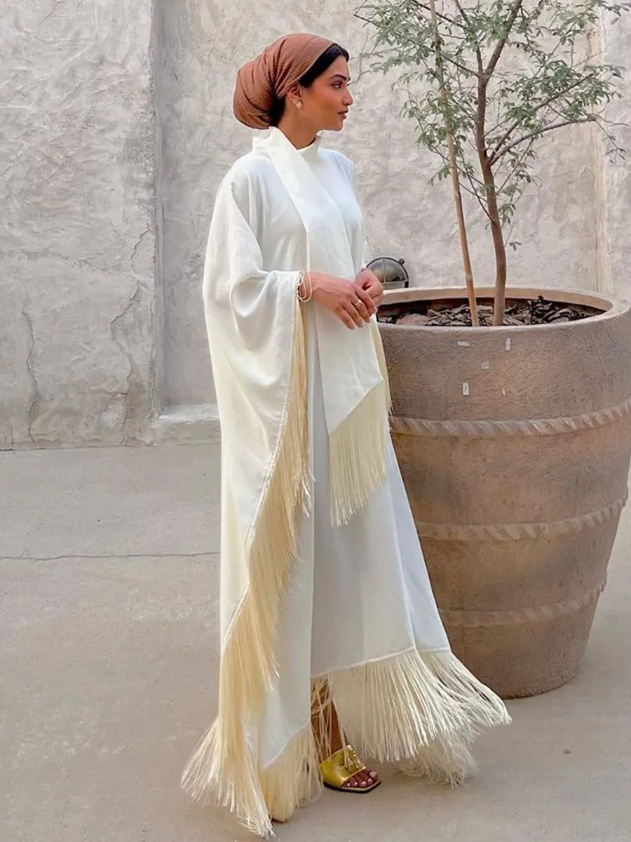 Мусульманские Дубаи Abayas для женщин, с рукавом Бэтмена, с бахромой, кафтан, тамадан, модное длинное платье, скромное вечернее женское Платье Макси 
Мусульманские Дубаи Abayas для женщин, с рукавом Бэтмена, с бахромой, кафтан, тамадан, модное длинное платье, скромное вечернее женское Платье Макси