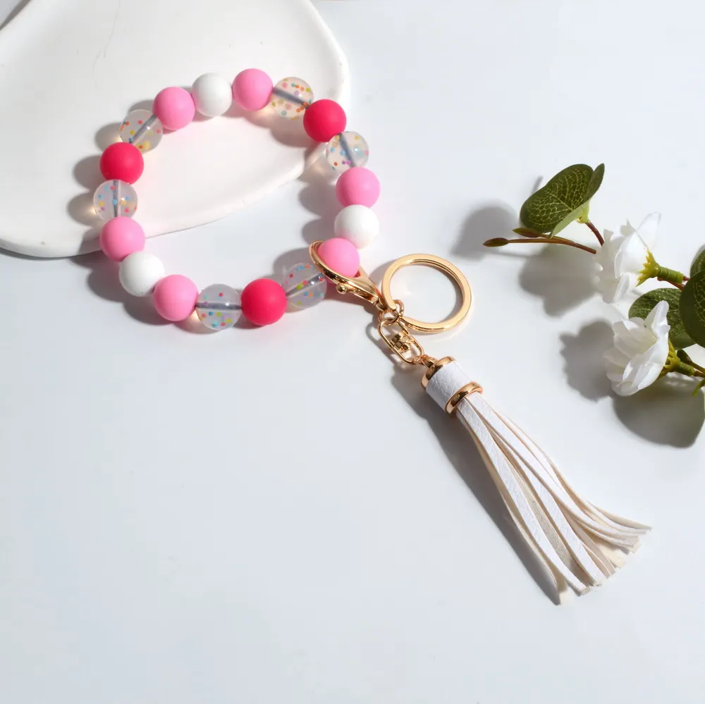 Pink Color Bracelet Keychain for Women Girls Simple Fashion Wrist Kechain Silicon Beads Long Tassel Key Chain Accessory
Pink Color Bracelet Keychain for Women Girls Simple Fashion Wrist Kechain Silicon Beads Long Tassel Key Chain Accessory