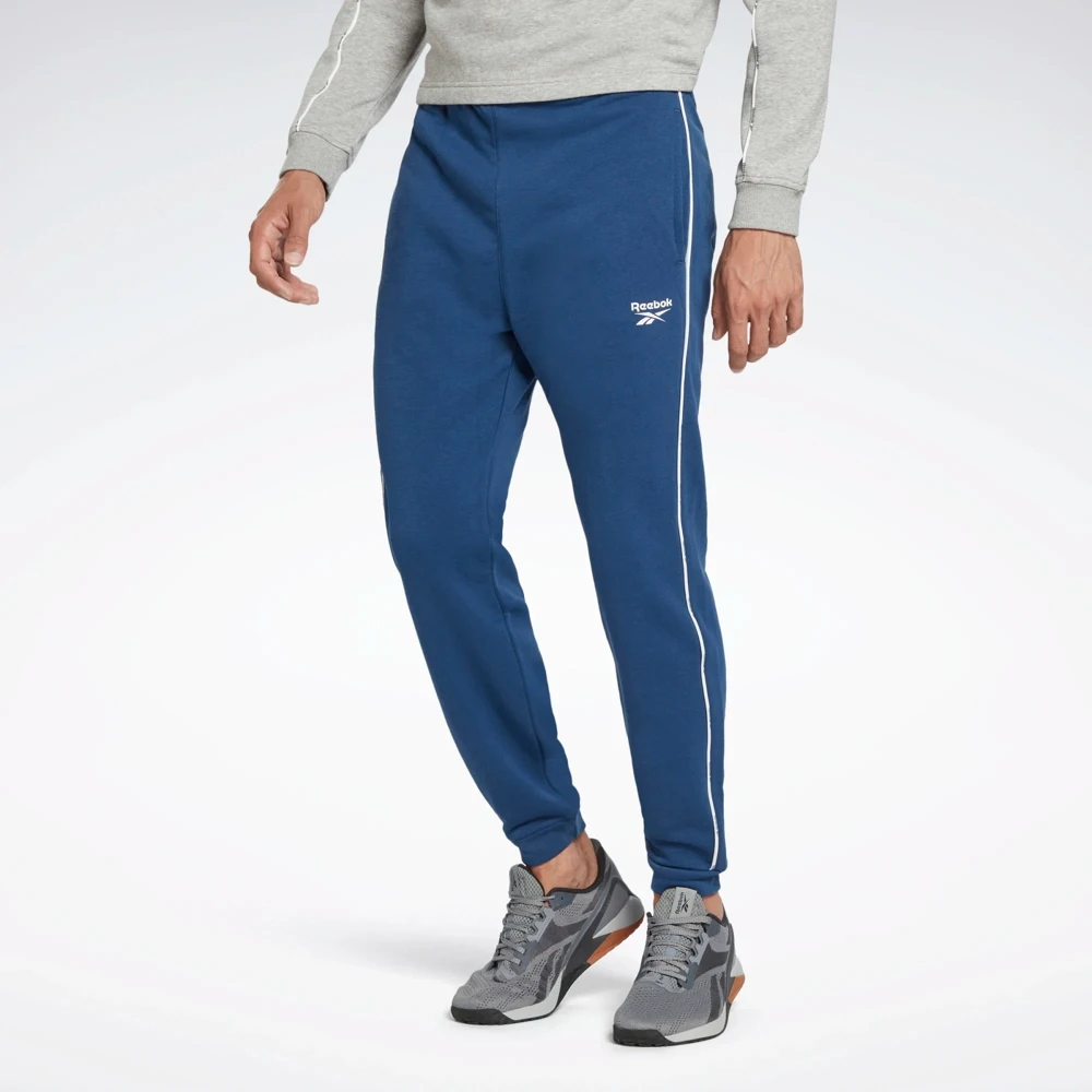 Спортивные брюки мужские Reebok Workout Ready Piping Joggers Pants HA1071 синий |