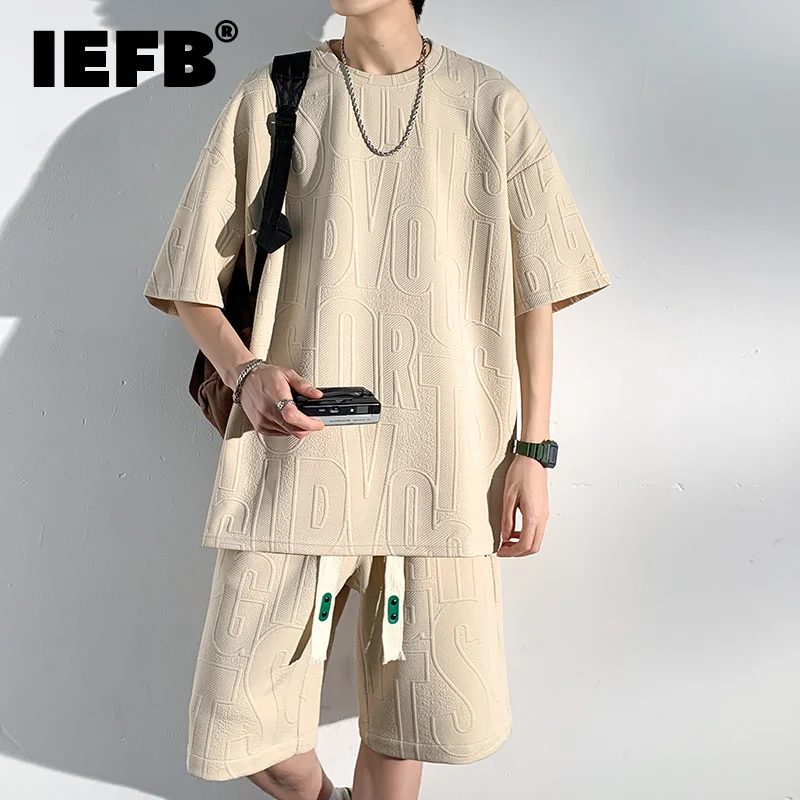 IEFB Men's Casual Shorts Two Picec Summer Looe Split Embossed Letter Short Sleeve T-shirt Set Male Knee Short Pnats Suits 9C424
IEFB Men's Casual Shorts Two Picec Summer Looe Split Embossed Letter Short Sleeve T-shirt Set Male Knee Short Pnats Suits 9C424