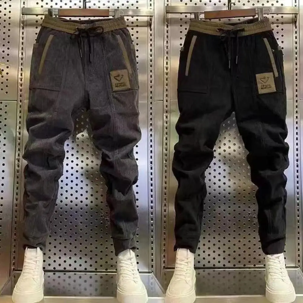 Стильные мужские однотонные шаровары с усадочными манжетами, повседневные брюки контрастных цветов, вельветовые брюки с защитой от пиллинга, повседневная одежда 
Стильные мужские однотонные шаровары с усадочными манжетами, повседневные брюки контрастных цветов, вельветовые брюки с защитой от пиллинга, повседневная одежда