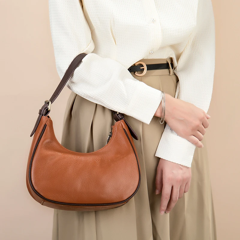 New French armpit bag Small crowd design Retro bag Tidy one shoulder cross body women's bag Crescent saddle bag 
New French armpit bag Small crowd design Retro bag Tidy one shoulder cross body women's bag Crescent saddle bag