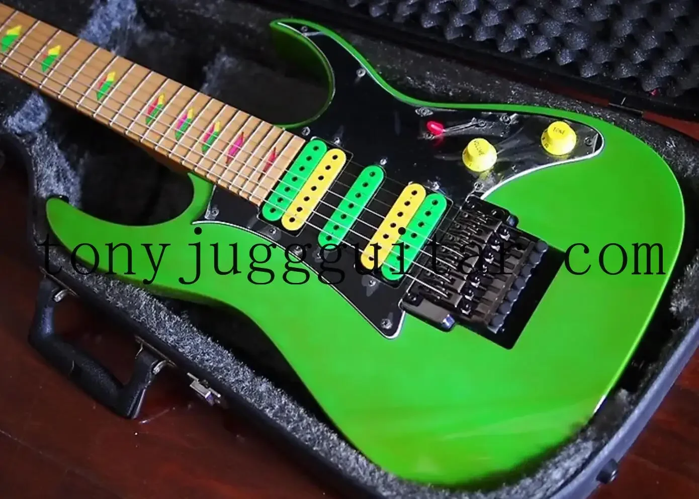 

UV777 Universe 7 String Vai Green Electric Guitar HSH Pickups, Floyd Rose Tremolo, Disappearing Pyramid inlay, Black Hardware