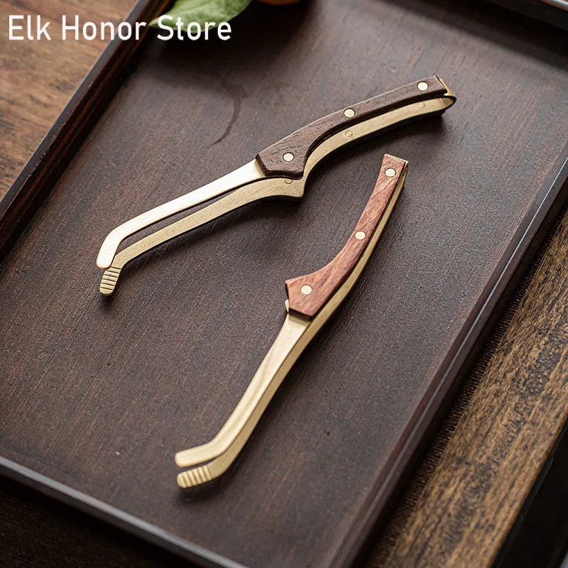 Copper Tea Clip Ebony Handle Household Tea Leaf Clip Tea Cup Household Tea Cup Clip Washing Cup Metal Tea Tweezers Accessories
Copper Tea Clip Ebony Handle Household Tea Leaf Clip Tea Cup Household Tea Cup Clip Washing Cup Metal Tea Tweezers Accessories