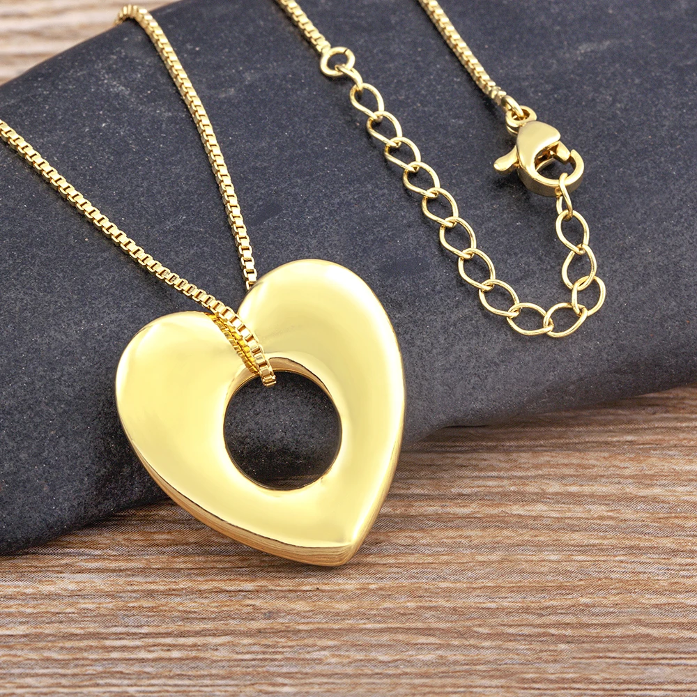 AIBEF New Woman Hollow Heart Chains Necklaces Fashion Trendy Jewelry Copper Pendant Necklace for Women Gift Jewelry
AIBEF New Woman Hollow Heart Chains Necklaces Fashion Trendy Jewelry Copper Pendant Necklace for Women Gift Jewelry