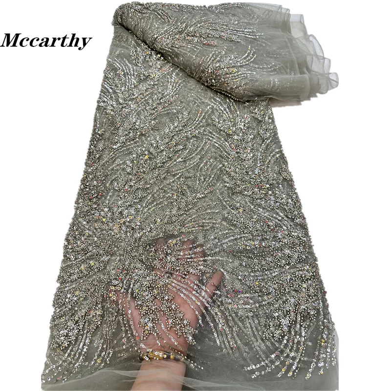 Новое поступление, французская сетчатая кружевная ткань Mccarthy с бисером, африканская Тюлевая кружевная ткань с вышивкой блестками для женского платья
Новое поступление, французская сетчатая кружевная ткань Mccarthy с бисером, африканская Тюлевая кружевная ткань с вышивкой блестками для женского платья