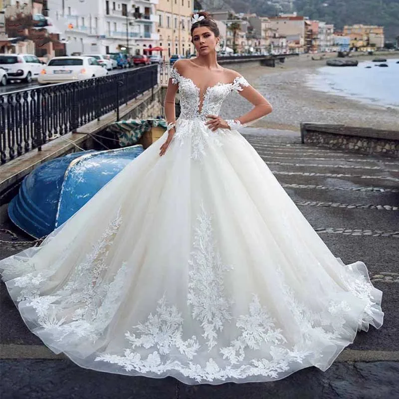 Elegant Princess Tulle Ball Gown Wedding Dresses Court Train Long Sleeves Lace Appliques Bridal Gowns
Elegant Princess Tulle Ball Gown Wedding Dresses Court Train Long Sleeves Lace Appliques Bridal Gowns