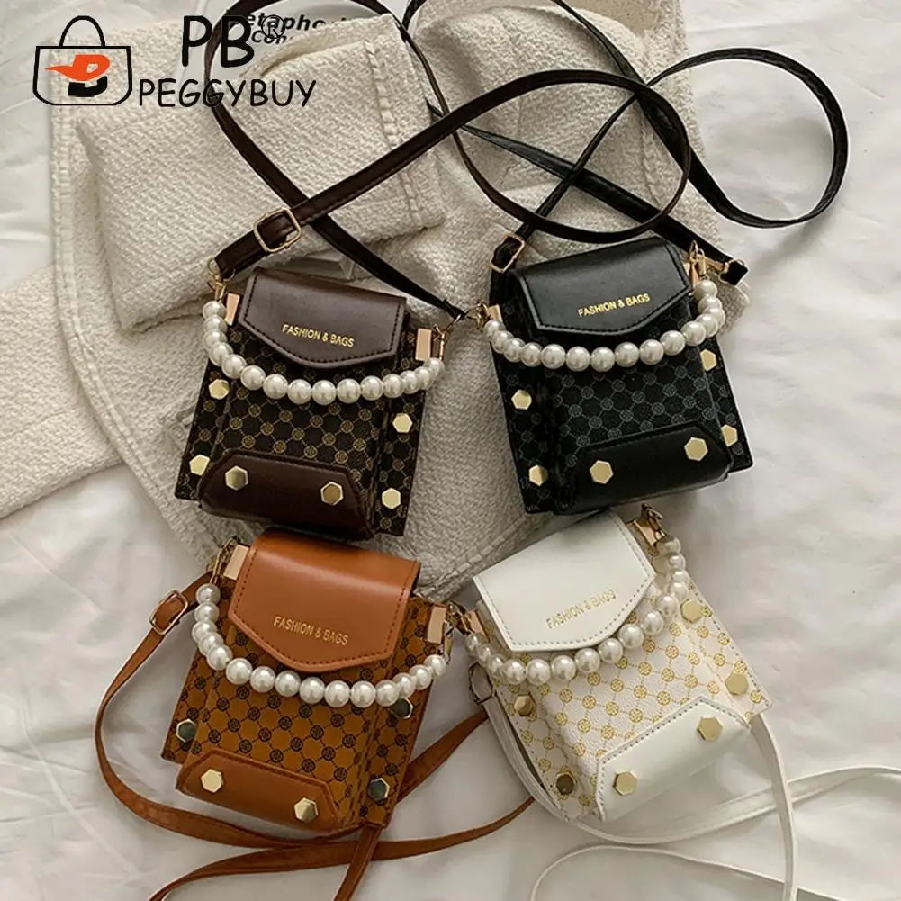 2022 Korean Style Minority PU Leather Shoulder Crossbody Mobile Phone Bag with Pearl Chain Fashion Sewing Thread Handbags
2022 Korean Style Minority PU Leather Shoulder Crossbody Mobile Phone Bag with Pearl Chain Fashion Sewing Thread Handbags