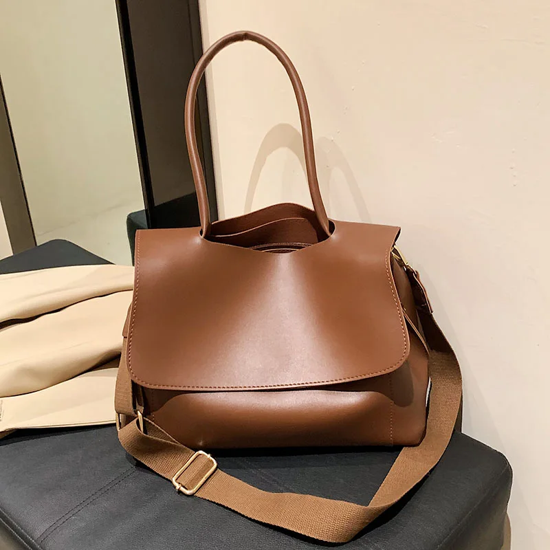 Vintage Solid color Big Lady Tote Bag 2022 New Quality PU Leather Women's Designer Handbags High Capacity Shoulder Messenger Bag
Vintage Solid color Big Lady Tote Bag 2022 New Quality PU Leather Women's Designer Handbags High Capacity Shoulder Messenger Bag
