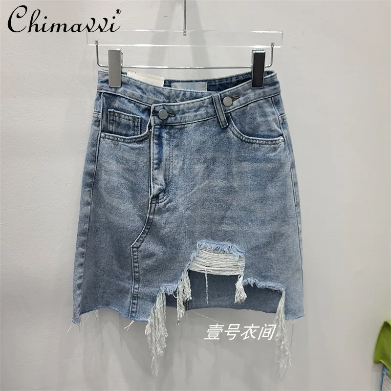 2022 Spring and Autumn New Fashion Slimming Thin Ripped Frayed Women's Jean Skirts Streetwear High Waist Irregular Denim Skirt 
2022 Spring and Autumn New Fashion Slimming Thin Ripped Frayed Women's Jean Skirts Streetwear High Waist Irregular Denim Skirt