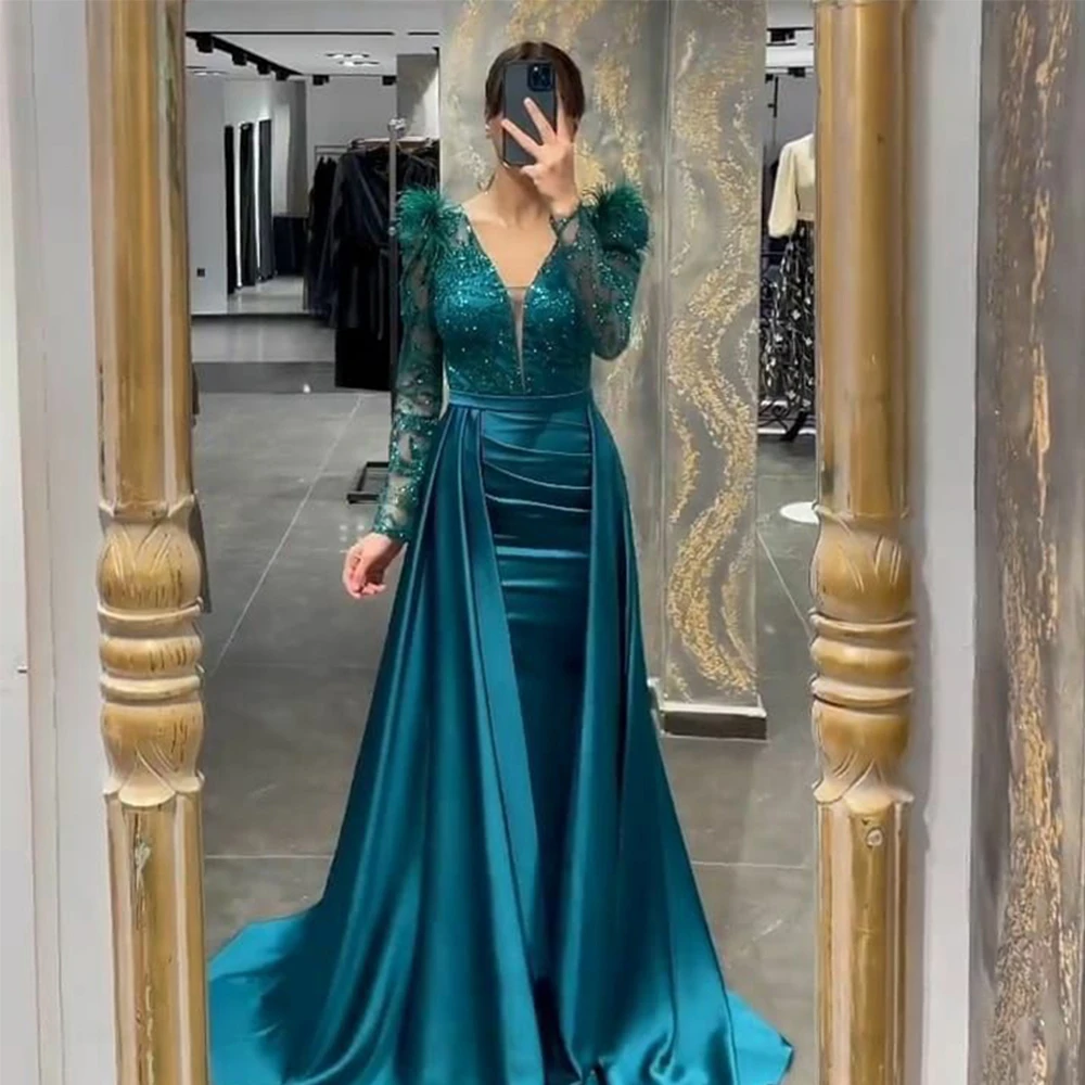 Exquisite Formal Evening Dresses 2022 V-Neck Feathers Long Sleeves Mermaid Prom Gowns Vintage Sequin Appliques Robes De Soirée
Exquisite Formal Evening Dresses 2022 V-Neck Feathers Long Sleeves Mermaid Prom Gowns Vintage Sequin Appliques Robes De Soirée