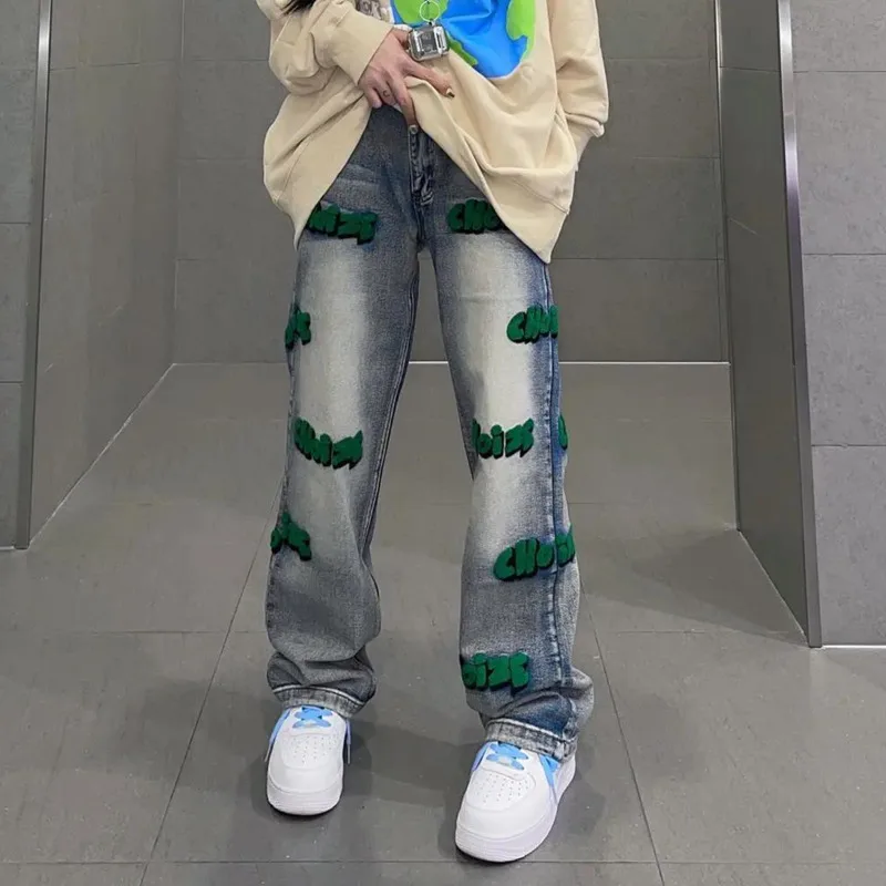 Large embroidered letters irregular jeans female loose fat sister high waist straight tube thin wide legs long pants fashion
Large embroidered letters irregular jeans female loose fat sister high waist straight tube thin wide legs long pants fashion