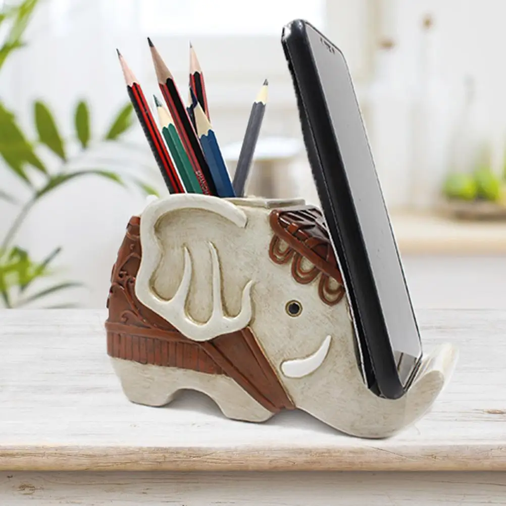 Elephant Shape Pen Pencil Holder with Cell Phone Stand Resin Desk Organizer Desk Decor Home Office Decoration Birthday Gift
Elephant Shape Pen Pencil Holder with Cell Phone Stand Resin Desk Organizer Desk Decor Home Office Decoration Birthday Gift