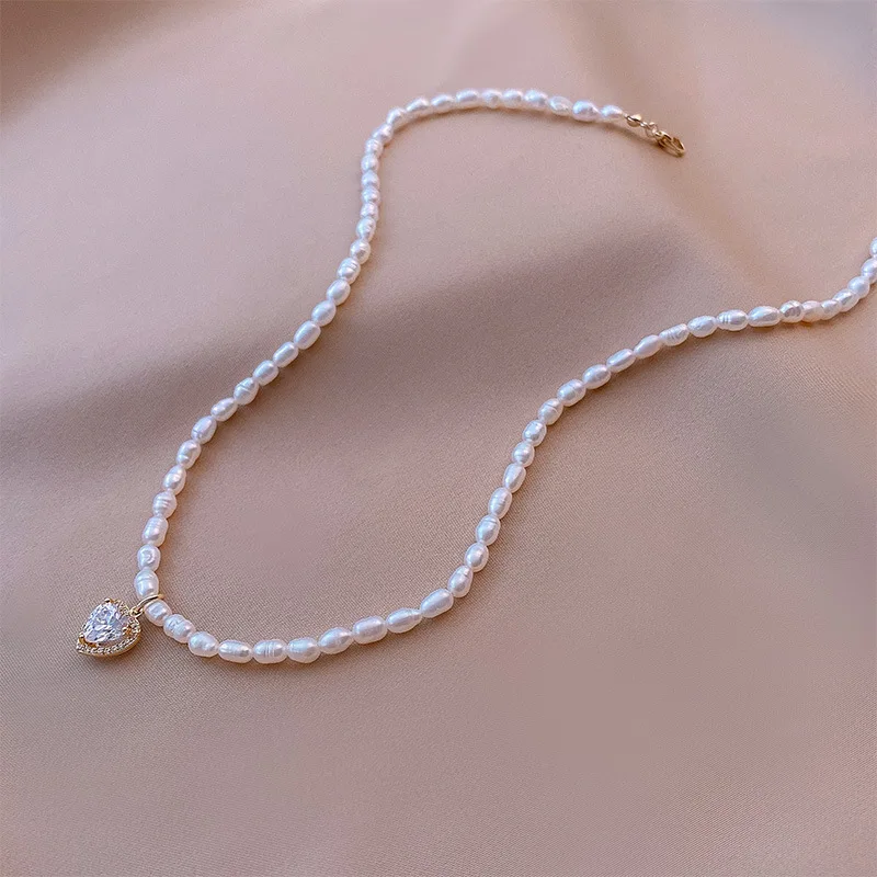 Minar Temperament Shinning Rhinestone Love Heart Pendant Necklace for Women Ladies Natural Freshwater Pearl Beaded Necklace
Minar Temperament Shinning Rhinestone Love Heart Pendant Necklace for Women Ladies Natural Freshwater Pearl Beaded Necklace