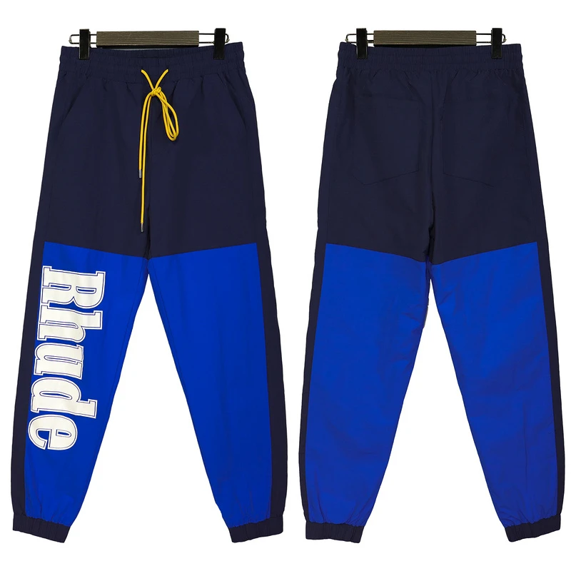New Rhude Patchwork Jogging Sweatpants Men Top Quality Overalls Casual Streetwear Big Logo Rhude Drawstring Women Pants Trousers
New Rhude Patchwork Jogging Sweatpants Men Top Quality Overalls Casual Streetwear Big Logo Rhude Drawstring Women Pants Trousers