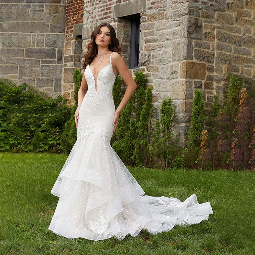 Mermaid Wedding Dresses 2022 V-Neck Backless Sleeveless Bridal Gowns Bohemian Lace Appliques Spaghetti Straps Vestido De Noiva 
Mermaid Wedding Dresses 2022 V-Neck Backless Sleeveless Bridal Gowns Bohemian Lace Appliques Spaghetti Straps Vestido De Noiva