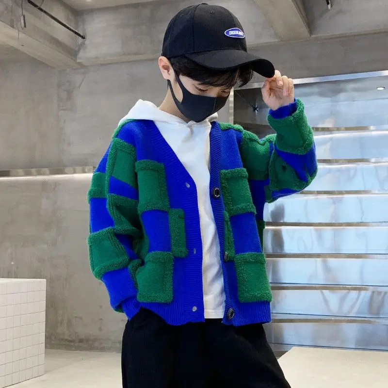 Весенне-Осенняя детская одежда для мальчиков вязаный кардиган пальто контрастные цвета однобортный с пряжкой в стиле пэчворк 2023
Весенне-Осенняя детская одежда для мальчиков вязаный кардиган пальто контрастные цвета однобортный с пряжкой в стиле пэчворк 2023