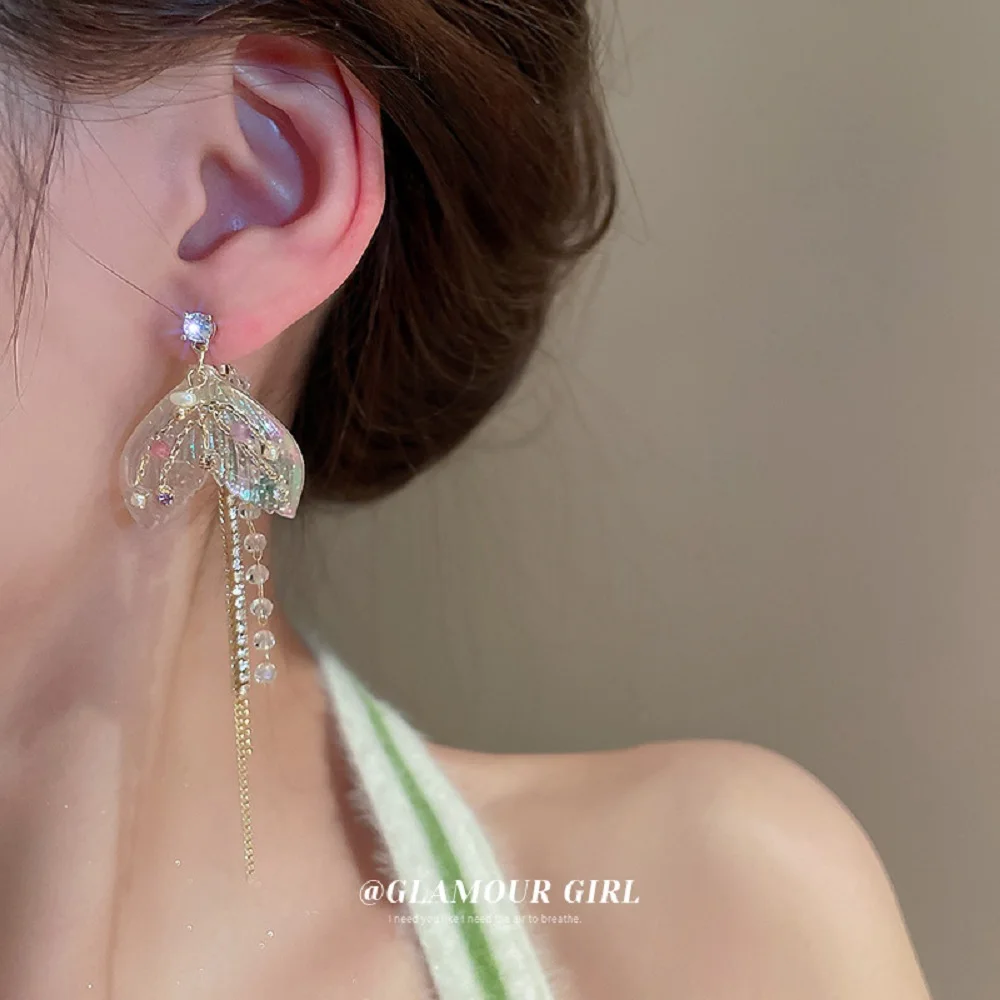 2022New Holiday Sea Jewelry Acrylic Crystal Brilliance Fishtail Drop Earrings For Women Rhinestone Pearl Long Tassels Eardrop
2022New Holiday Sea Jewelry Acrylic Crystal Brilliance Fishtail Drop Earrings For Women Rhinestone Pearl Long Tassels Eardrop
