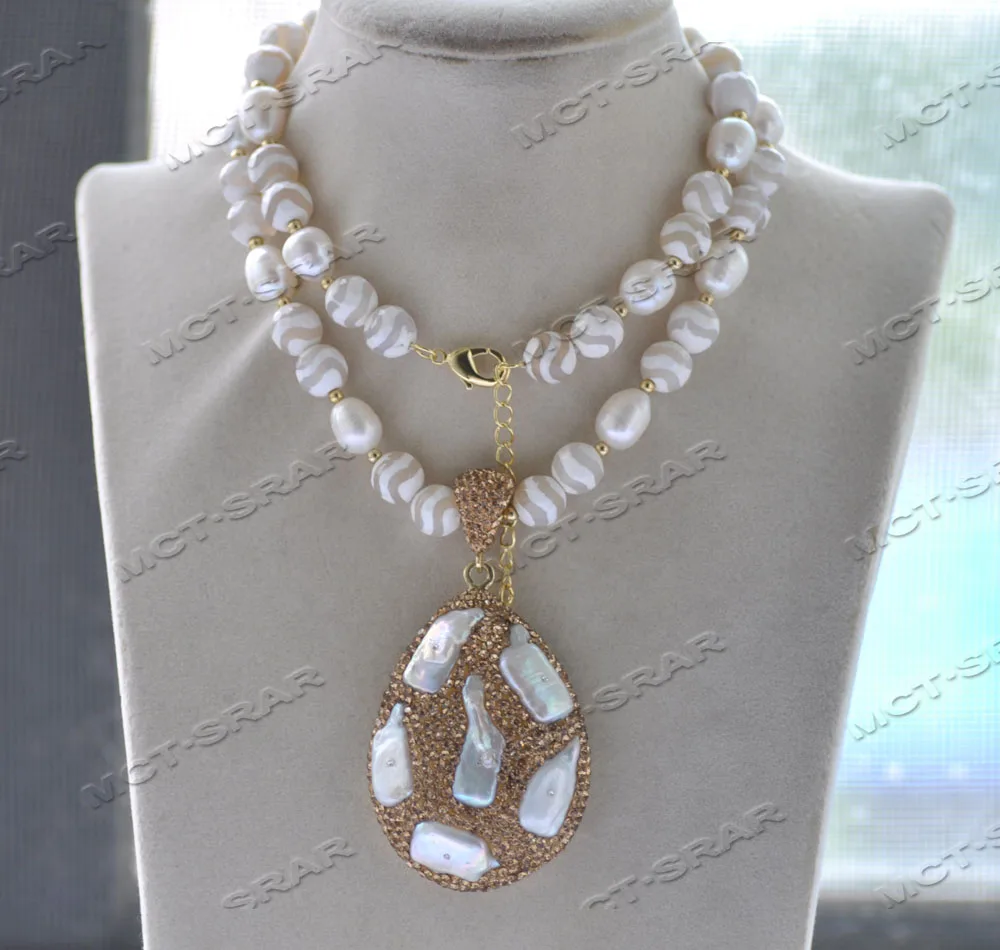 MCT·STAR Z11988 27'' 58mm White Rice Pearl Faceted Agate Necklace CZ Pendant
MCT·STAR Z11988 27'' 58mm White Rice Pearl Faceted Agate Necklace CZ Pendant