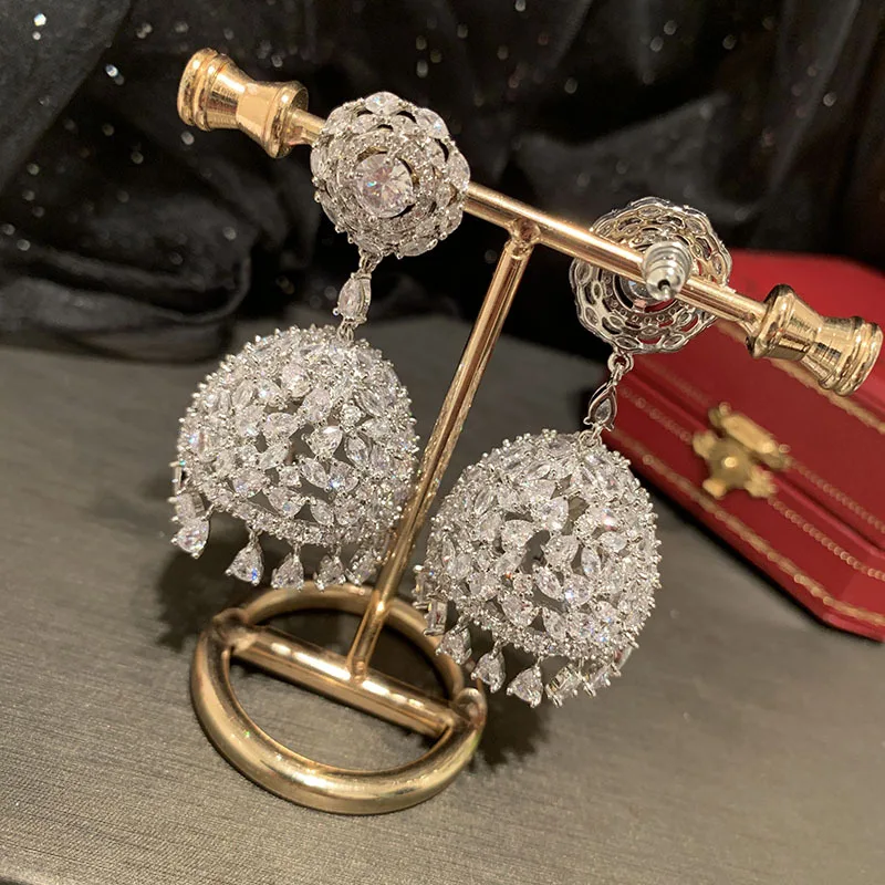 Серьги HandmadeTassel в виде замка, милые преувеличенные цветы, суперблестящие циркониевые светящиеся Роскошные тонкие круглые серьги богини
Серьги HandmadeTassel в виде замка, милые преувеличенные цветы, суперблестящие циркониевые светящиеся Роскошные тонкие круглые серьги богини