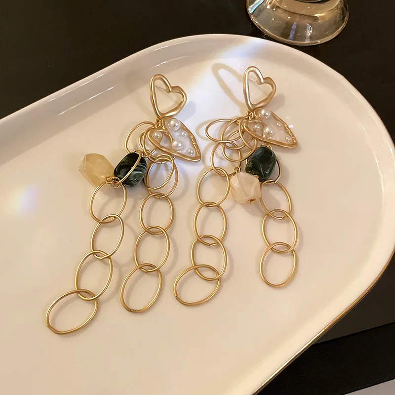 Resin Pearl Love Tassel Earrings Korean Design Sense Ins Wind Earrings Simple Fashion Women S925 Silver Needle
Resin Pearl Love Tassel Earrings Korean Design Sense Ins Wind Earrings Simple Fashion Women S925 Silver Needle